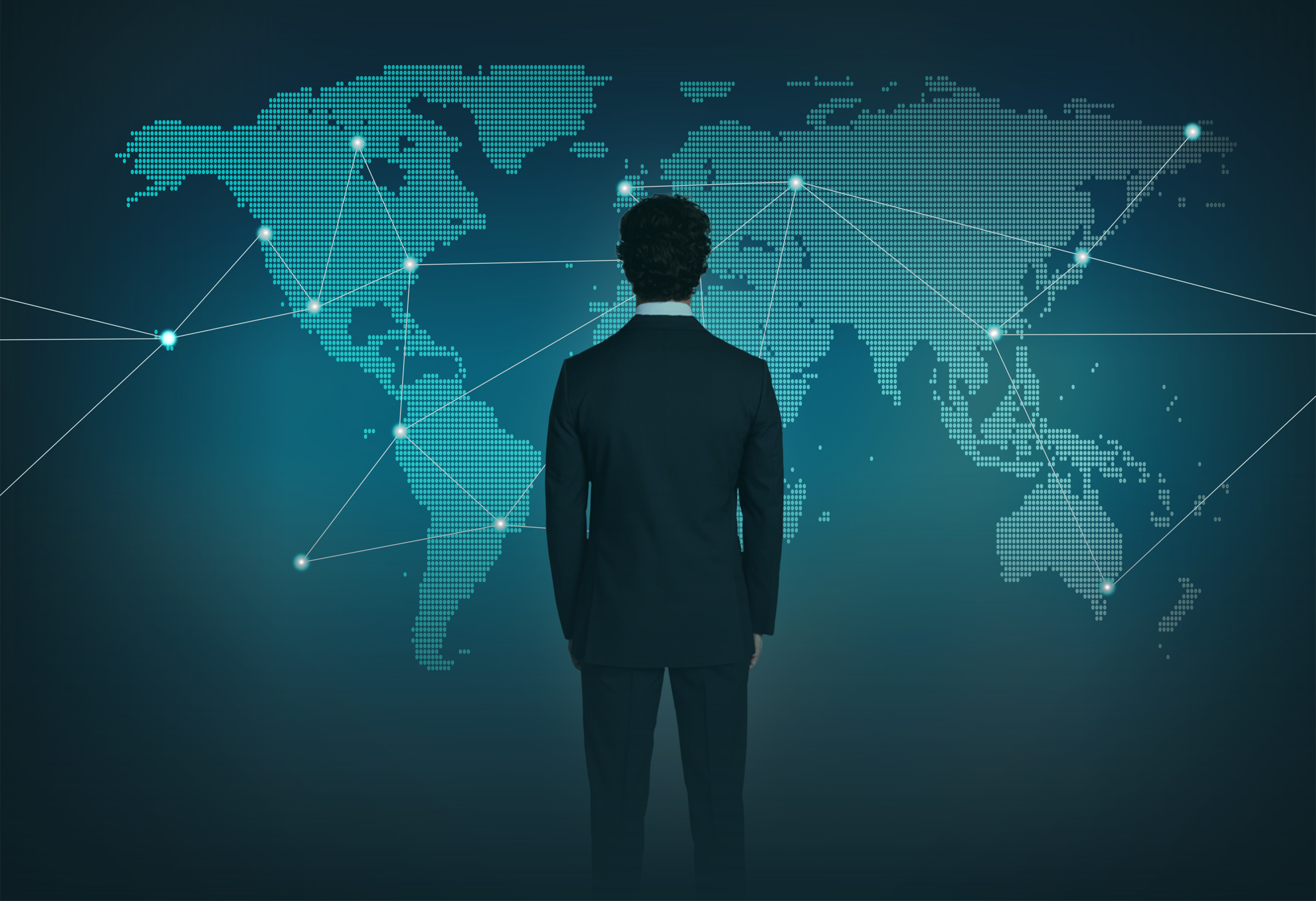 Senior Management and Business Strategy -  Businessman Facing World Map